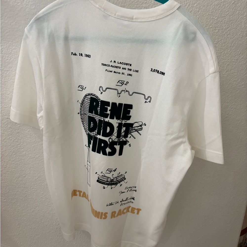 Lacoste Cream Tee with Black and Gold Accents